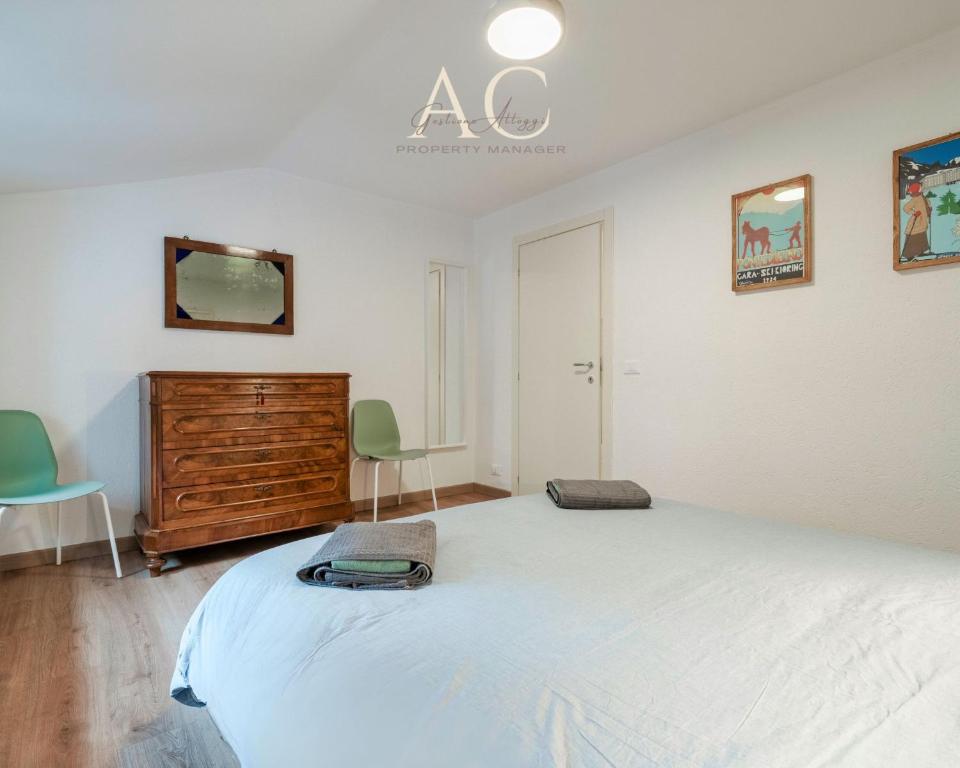 A bed or beds in a room at Square Apartment