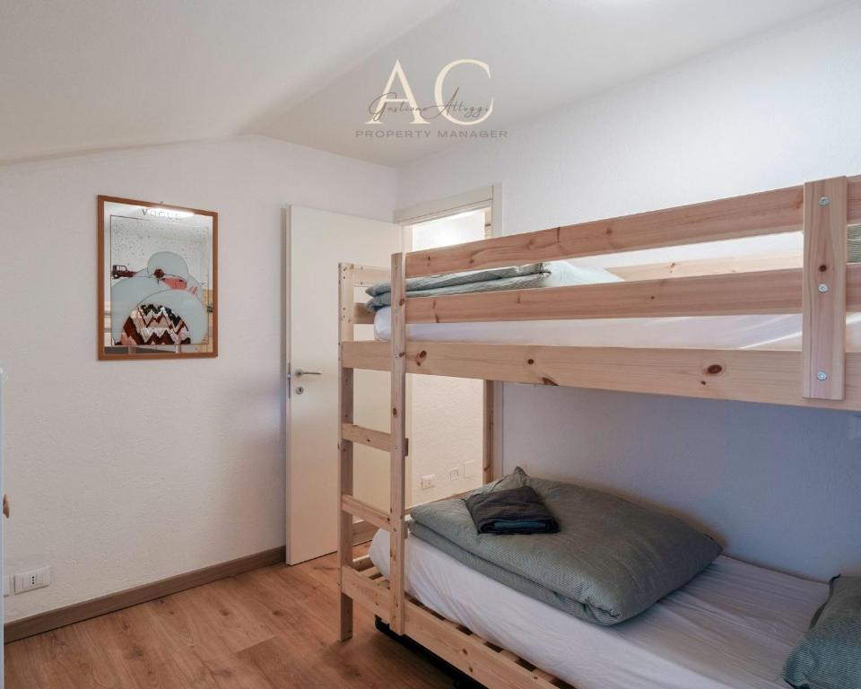 A bed or beds in a room at Square Apartment