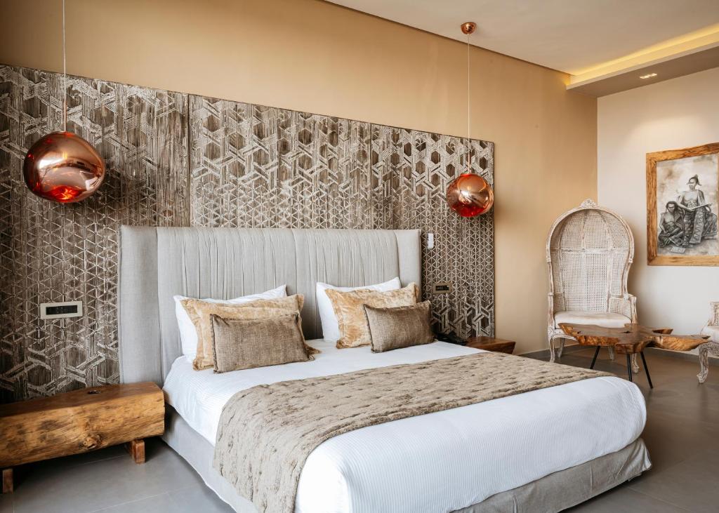 Una cama o camas en una habitación de Bavaro Beach Dakhla