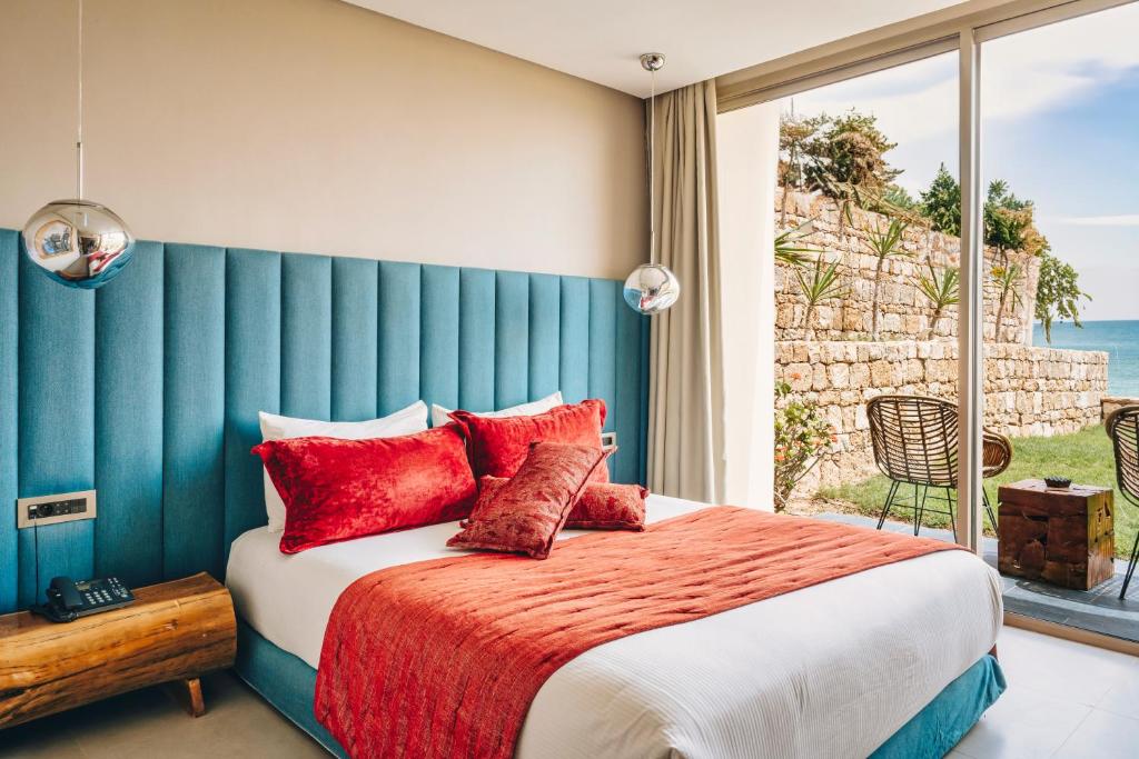 Una cama o camas en una habitación de Bavaro Beach Dakhla
