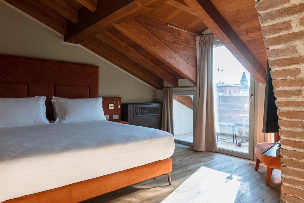 Postel nebo postele na pokoji v ubytování Pavillon Suite