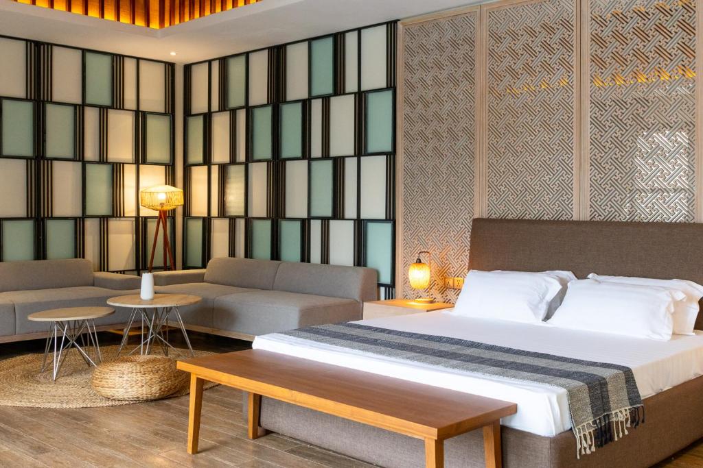 Postel nebo postele na pokoji v ubytování Ream YoHo Resort