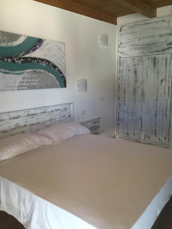 Postel nebo postele na pokoji v ubytování Aquila Di Mare