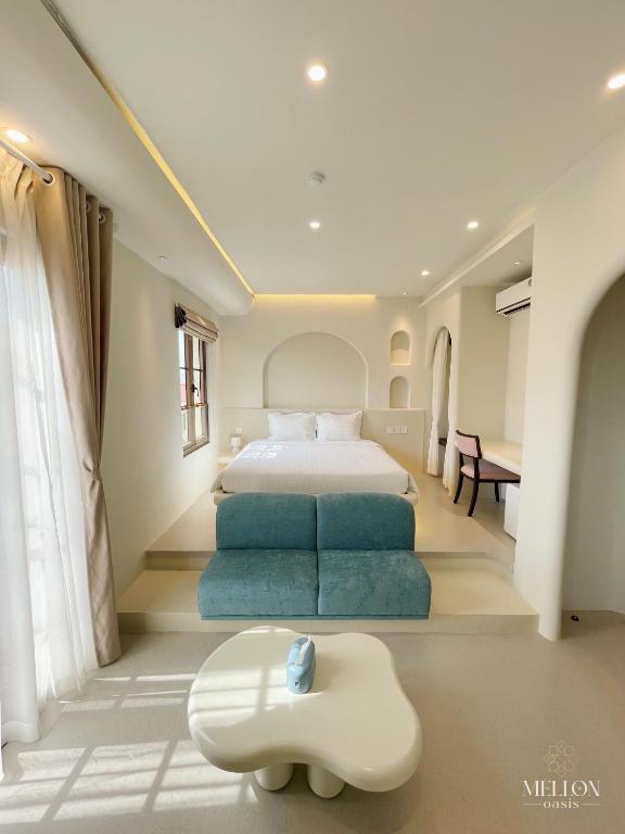 Giường trong phòng chung tại Mellon OASIS Phu Quoc