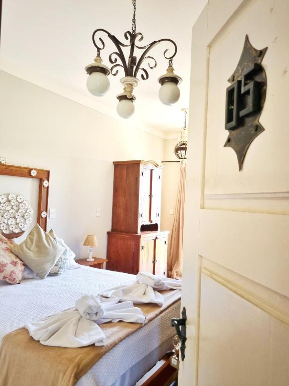 Postel nebo postele na pokoji v ubytování Pousada Dom Xavier