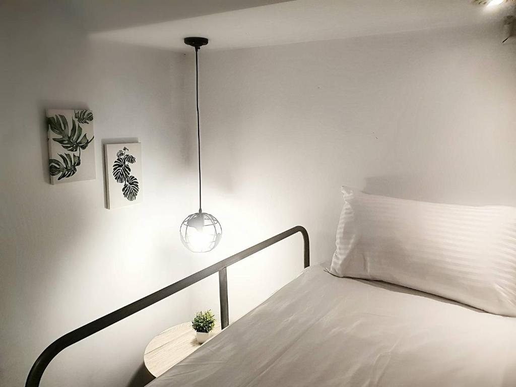 Postel nebo postele na pokoji v ubytování COZY Home