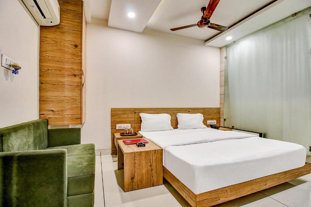 Postel nebo postele na pokoji v ubytování FabHotel Prime Manjeet