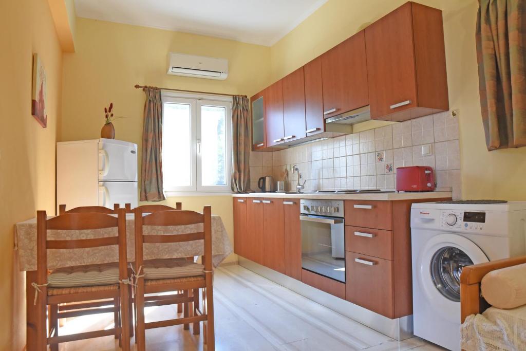 Kuchyňa alebo kuchynka v ubytovaní Butterfly Barbati apartments