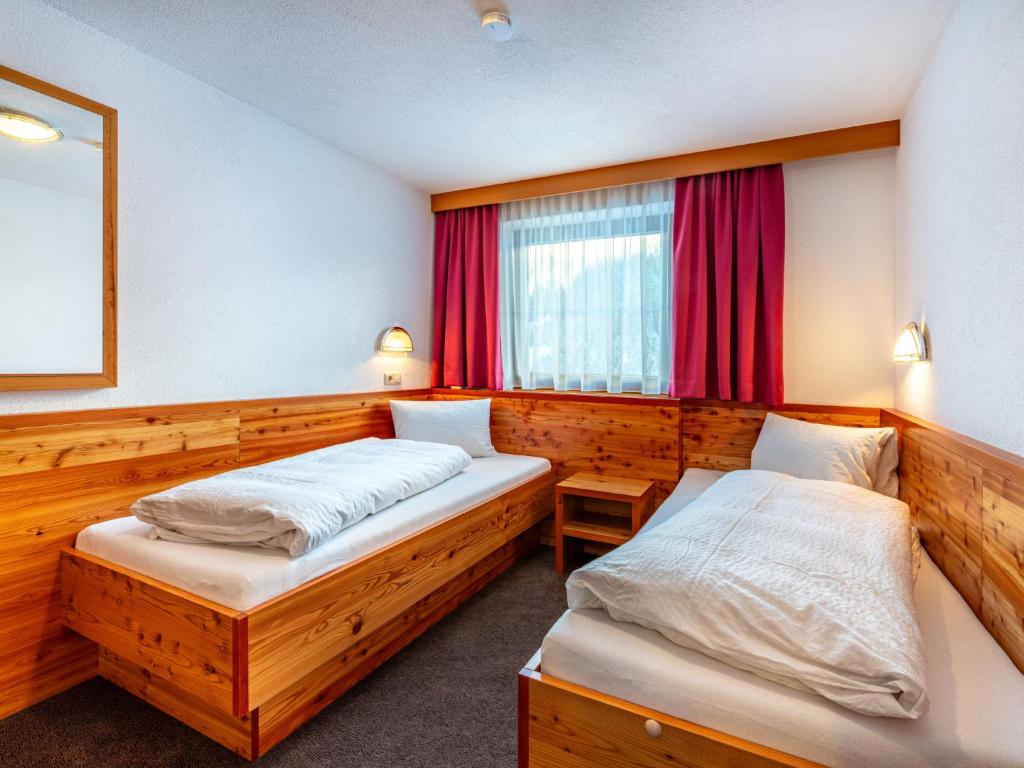 Posteľ alebo postele v izbe v ubytovaní Apartment Sailer-3 by Interhome