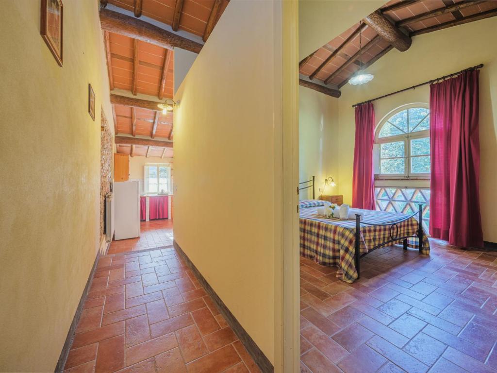 Posteľ alebo postele v izbe v ubytovaní Apartment Le Fornaci-3 by Interhome