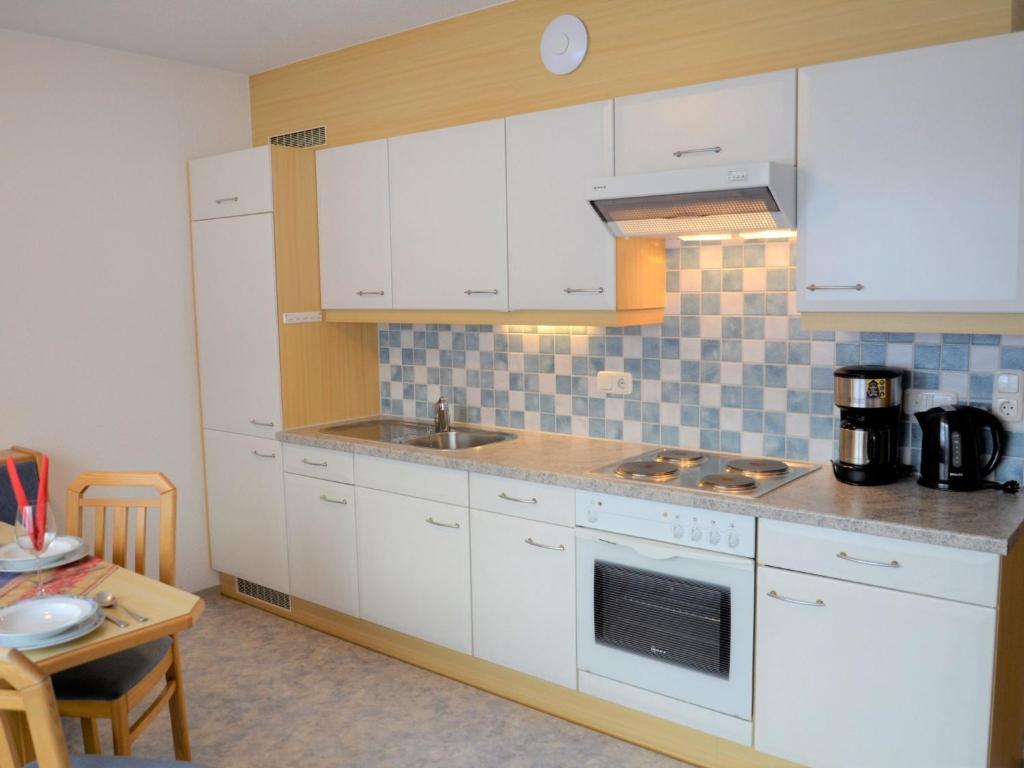 Kuchyň nebo kuchyňský kout v ubytování Apartment Elfriede-1 by Interhome