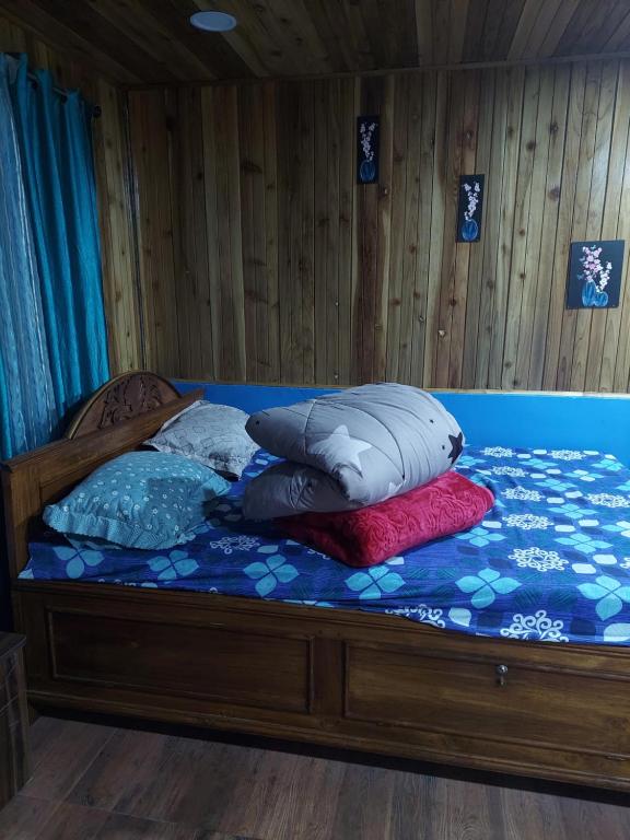 Postel nebo postele na pokoji v ubytování Athithi homestay