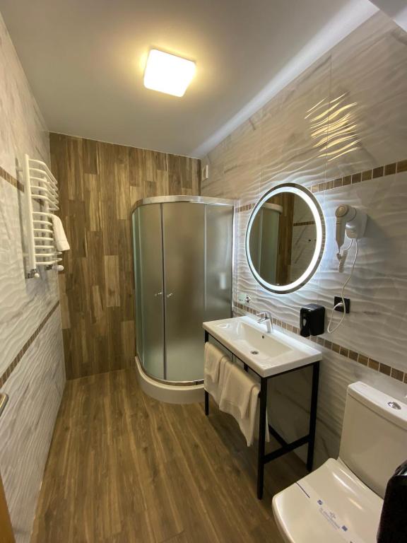 Koupelna v ubytování VATRA HOTEL