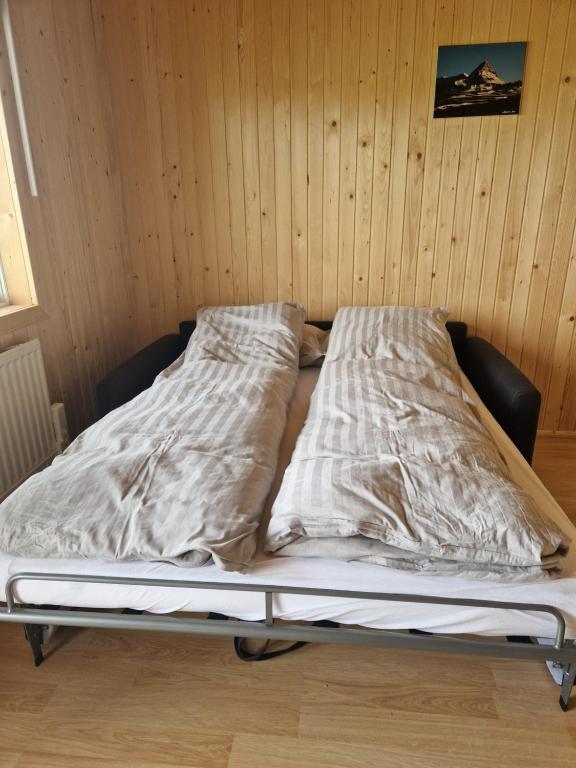 Postel nebo postele na pokoji v ubytování Mófellsstaðakot