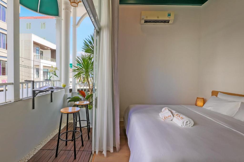 Giường trong phòng chung tại Lemi - Homestay in Hue