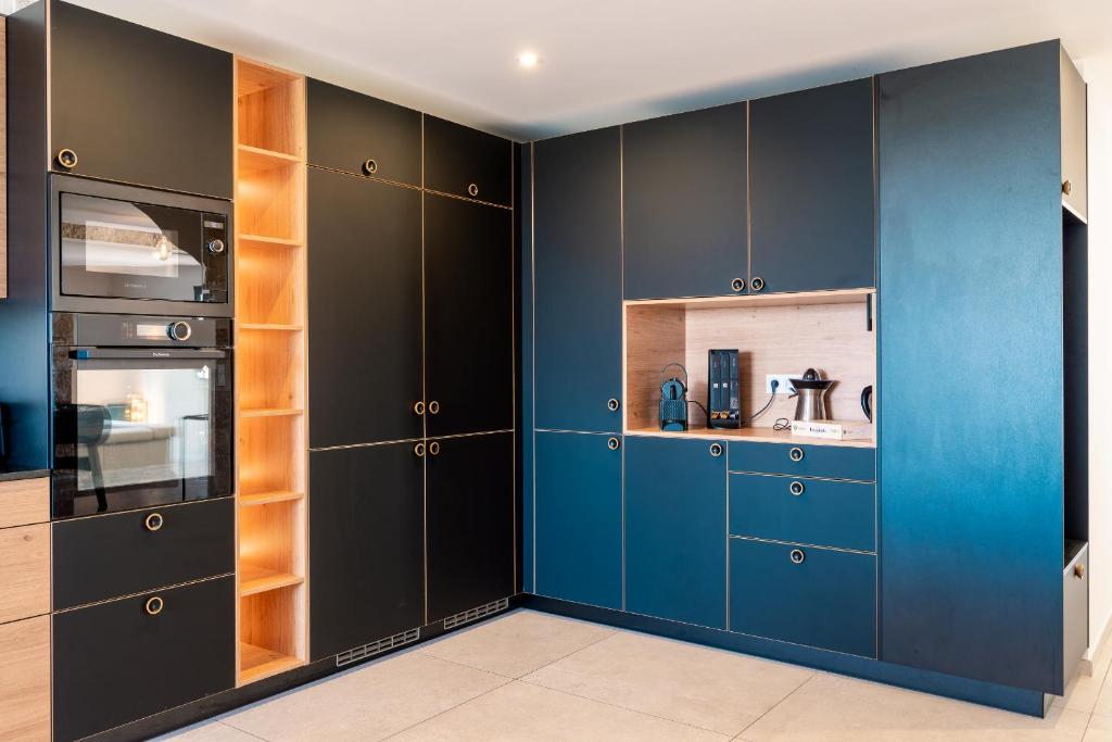 Kuchyň nebo kuchyňský kout v ubytování Mas Sureda - Evasion luxueuse avec vue panoramique