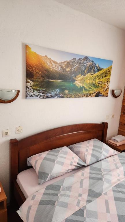 Postel nebo postele na pokoji v ubytování Olja Guest House