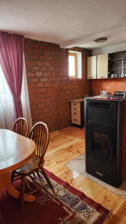 Kuchyň nebo kuchyňský kout v ubytování Olja Guest House