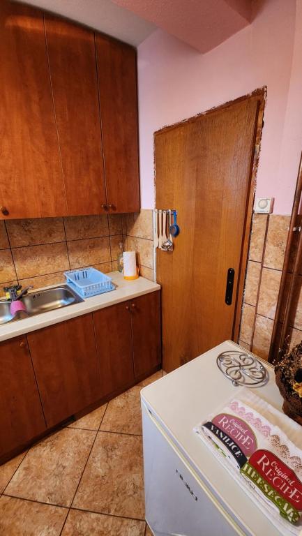 Kuchyň nebo kuchyňský kout v ubytování Olja Guest House