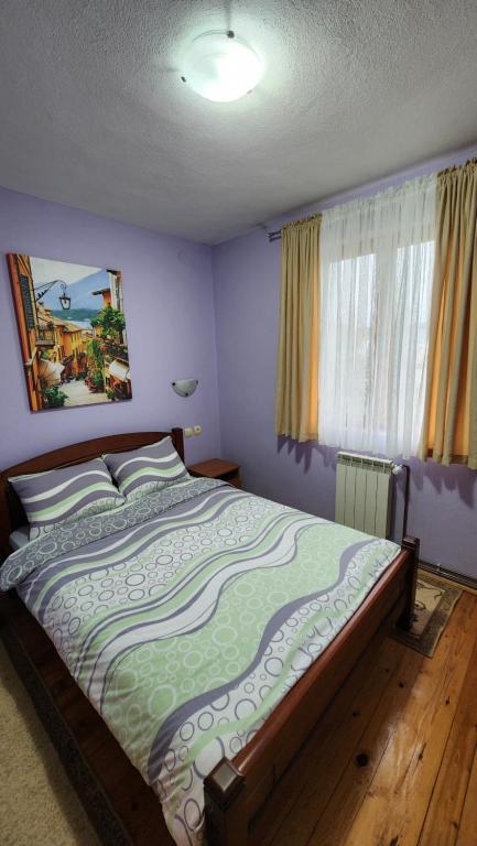 Postel nebo postele na pokoji v ubytování Olja Guest House