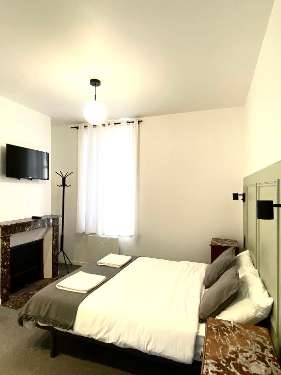 Postel nebo postele na pokoji v ubytování VILLA VLAS - Chambre d'Hôte - Limoges