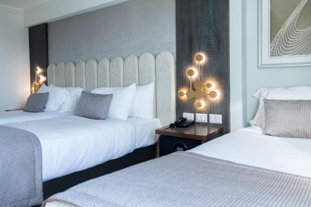Postel nebo postele na pokoji v ubytování Hotel HW High Wellness