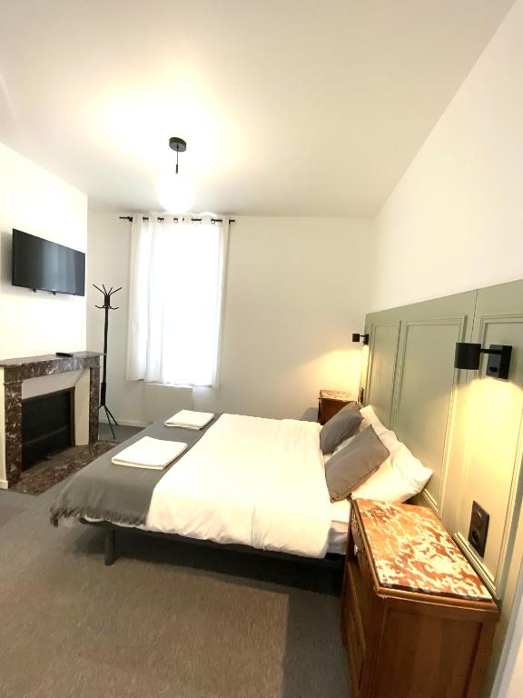 Postel nebo postele na pokoji v ubytování VILLA VLAS - Chambre d'Hôte - Limoges