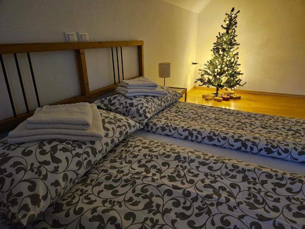 Postel nebo postele na pokoji v ubytování Apartma Stenar