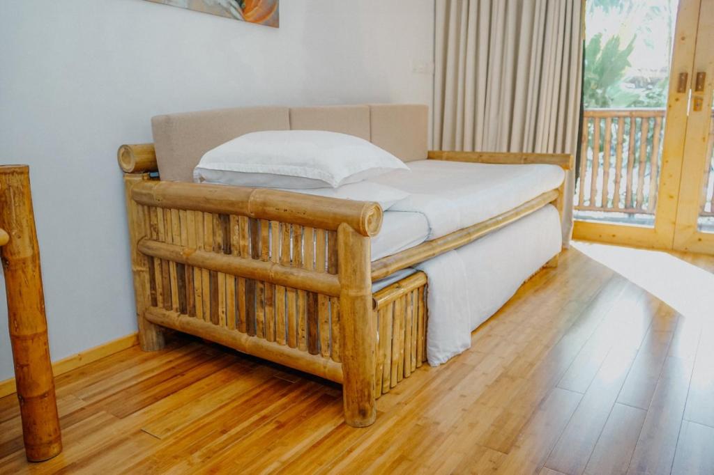 Postel nebo postele na pokoji v ubytování Ecoboo Maldives