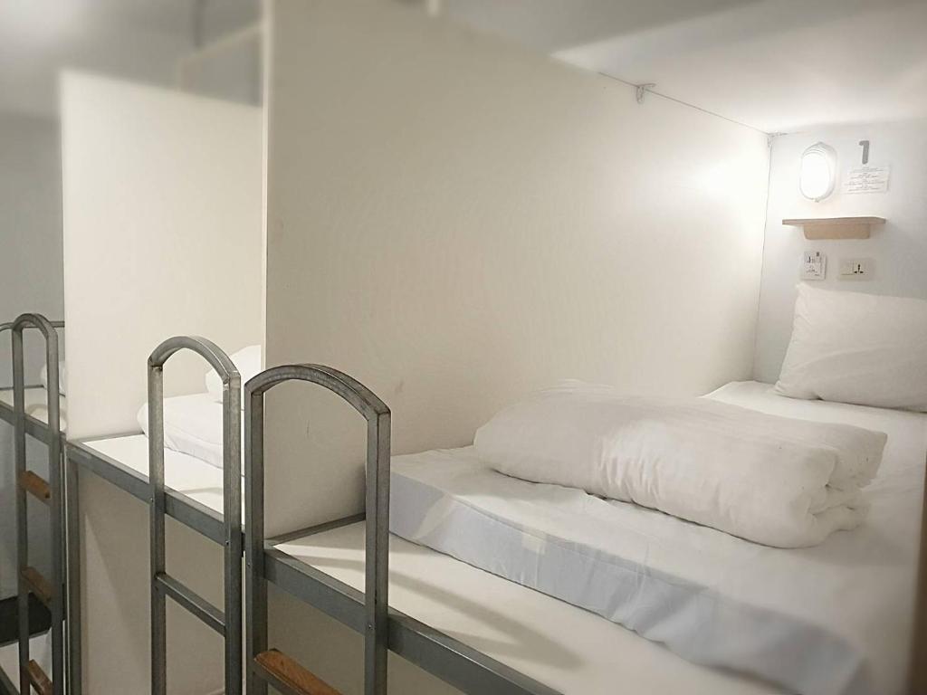 Postel nebo postele na pokoji v ubytování COZY Home