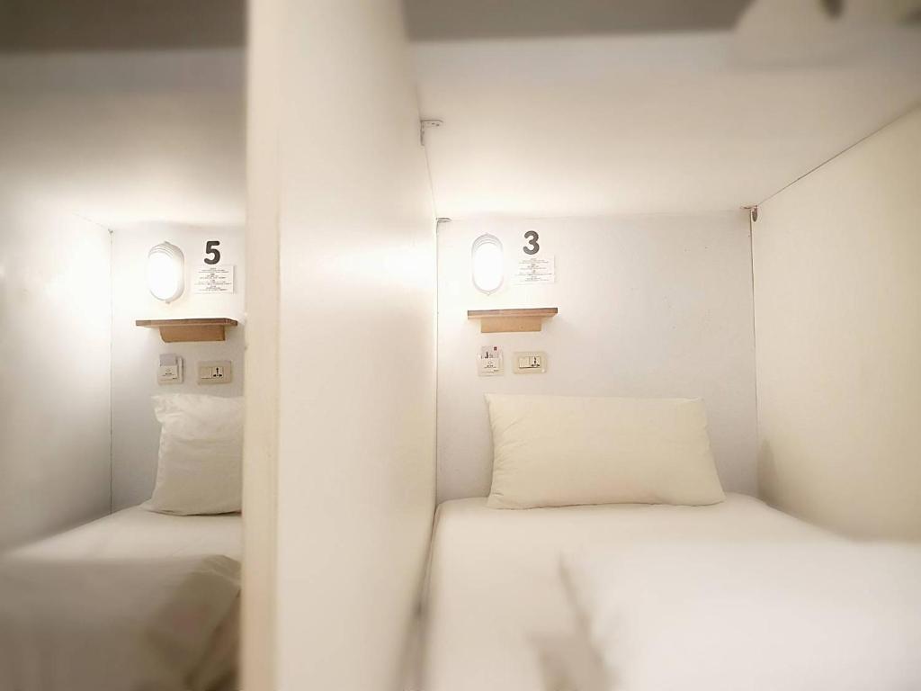 Postel nebo postele na pokoji v ubytování COZY Home