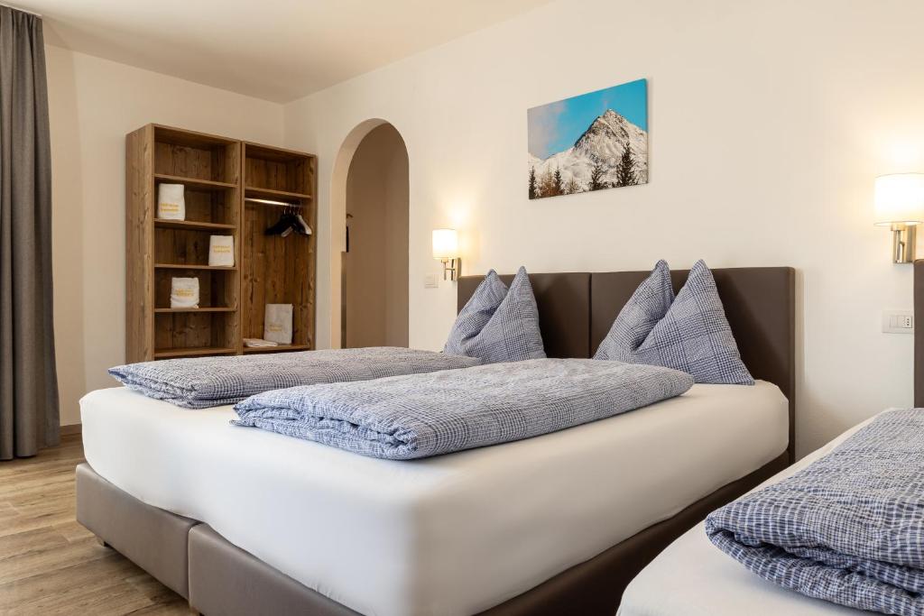 Postel nebo postele na pokoji v ubytování B&B Hotel Sonneck