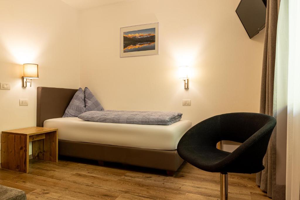 Postel nebo postele na pokoji v ubytování B&B Hotel Sonneck