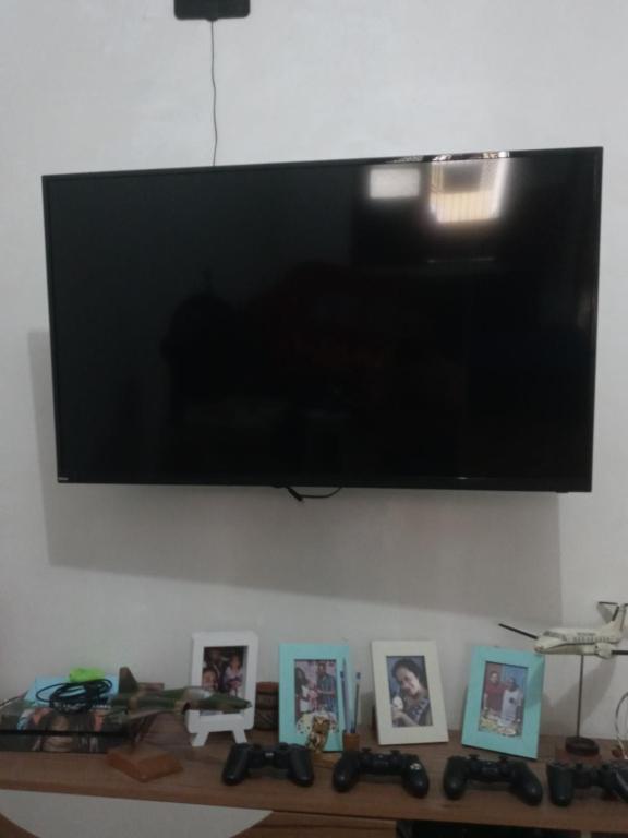 TV a/nebo společenská místnost v ubytování Quarto espetacular próximo à UFPA e ao Centro comercial