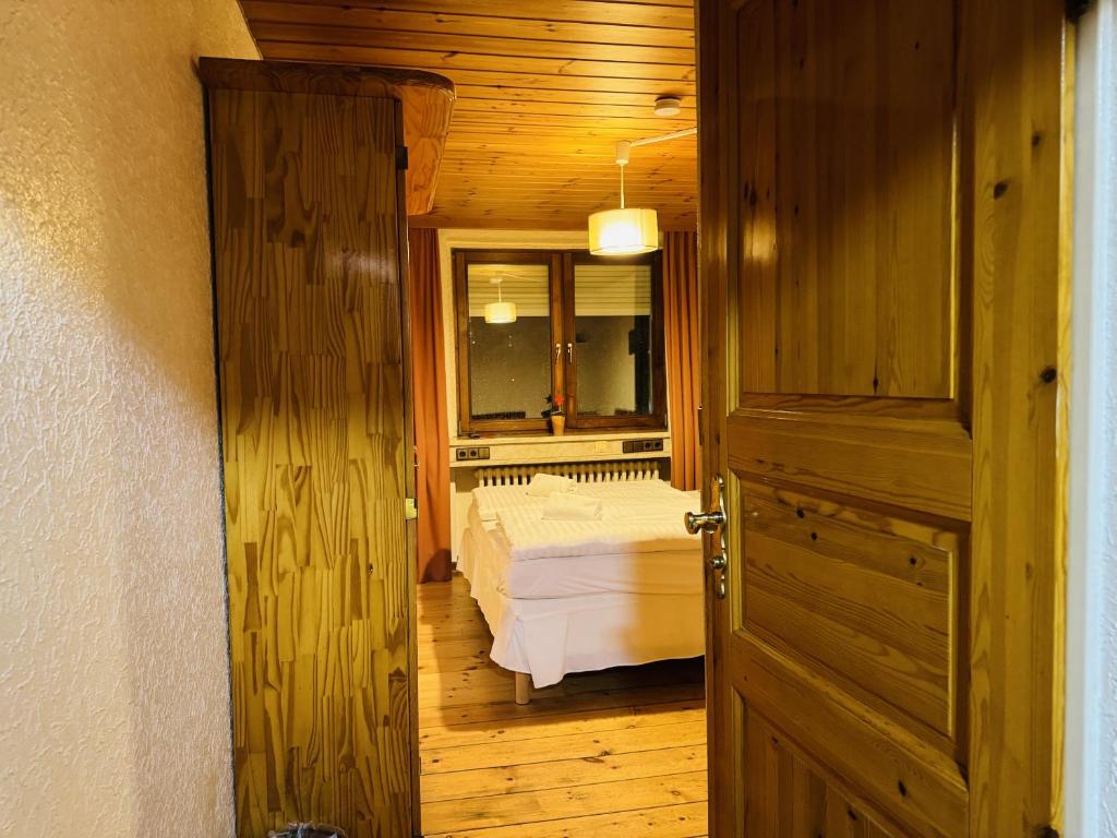 Postel nebo postele na pokoji v ubytování Hotel Nest