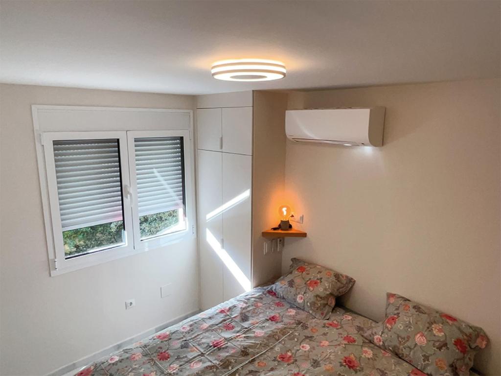 Postel nebo postele na pokoji v ubytování Apartment Mijas Costa Beachfront - Marbella