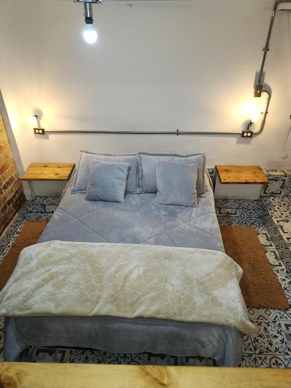 Postel nebo postele na pokoji v ubytování Samor centro histórico Bogota