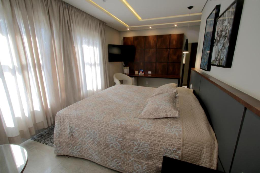 Postel nebo postele na pokoji v ubytování Adria Premium Hotel