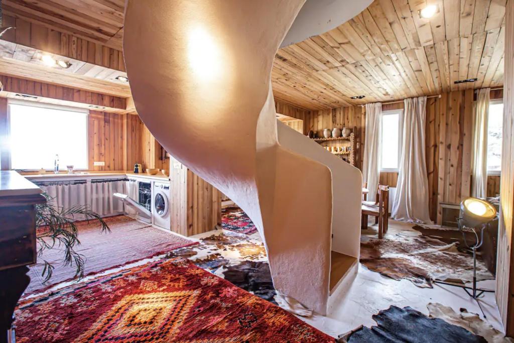 a living room with a large object in the middle at LUXURY CASA DÚPLEX acceso directo a pistas y garaje in Sierra Nevada
