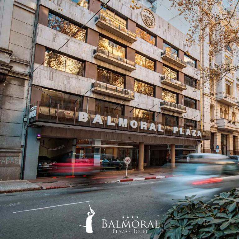 a building on a street with cars in front of it at BALMORAL PLAZA HOTEL in Montevideo