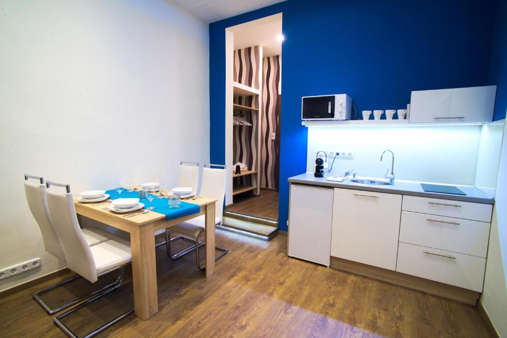 Kuchyňa alebo kuchynka v ubytovaní Focus Point Apartments