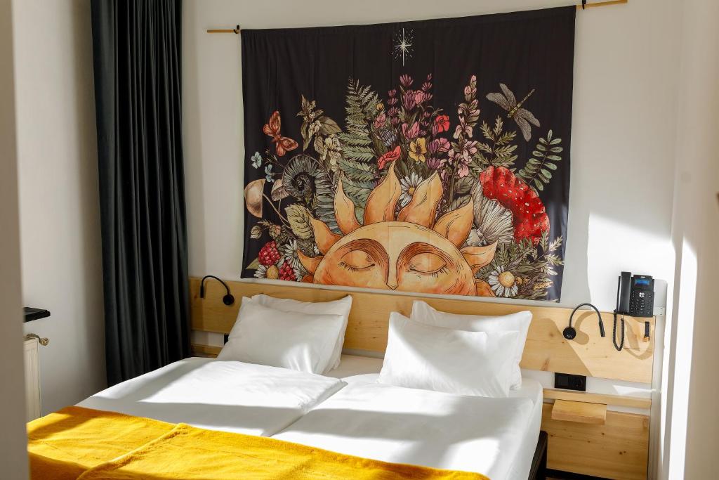 Letto o letti in una camera di Hydeout Bakuriani