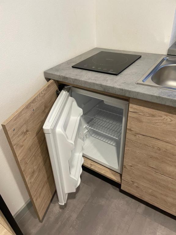 Kuchyň nebo kuchyňský kout v ubytování Ubytovacie zariadenie U Mudajov