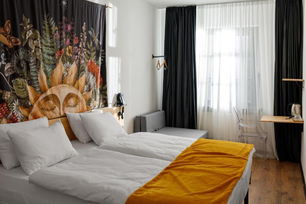 Letto o letti in una camera di Hydeout Bakuriani