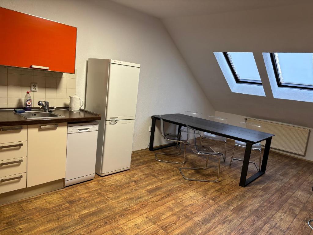 Kuchyň nebo kuchyňský kout v ubytování Apartmány Zahradní