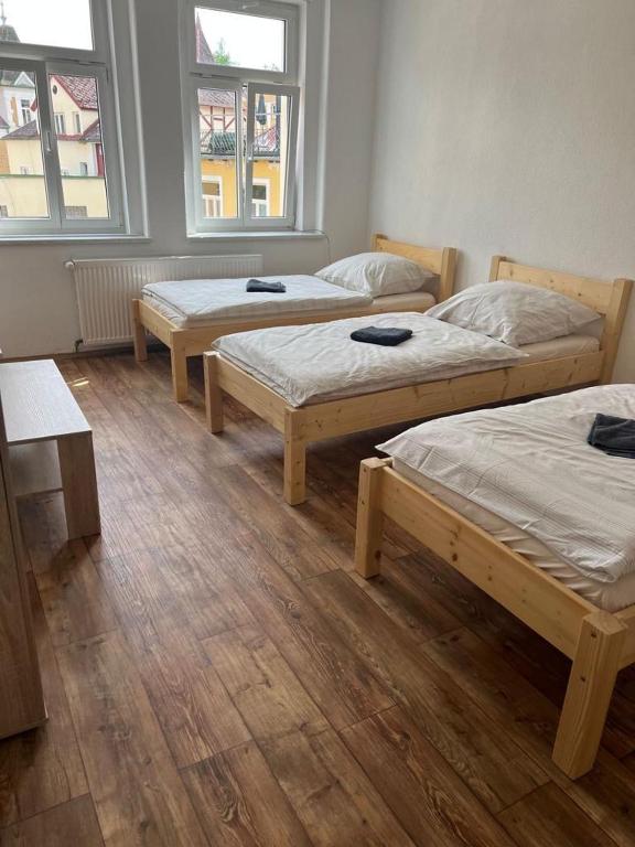 Postel nebo postele na pokoji v ubytování Apartmány Zahradní