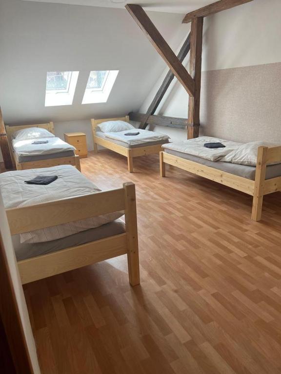Postel nebo postele na pokoji v ubytování Apartmány Zahradní