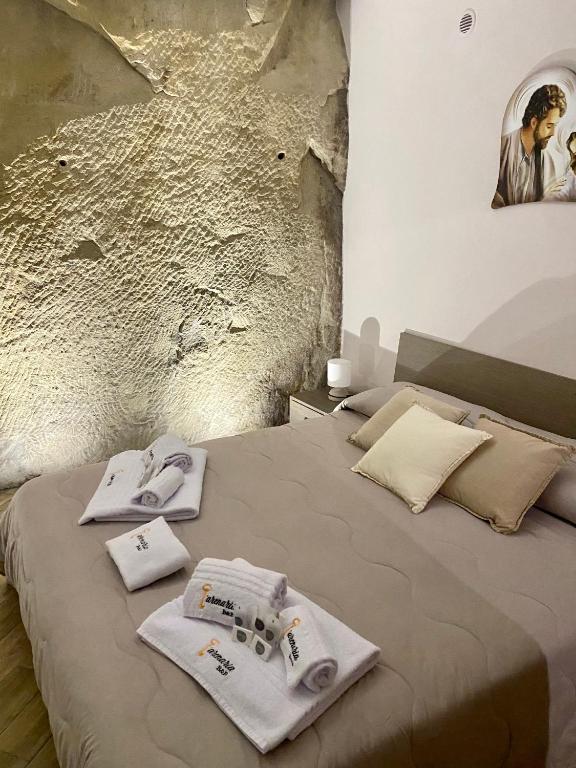 Postel nebo postele na pokoji v ubytování B&B L'Arenaria
