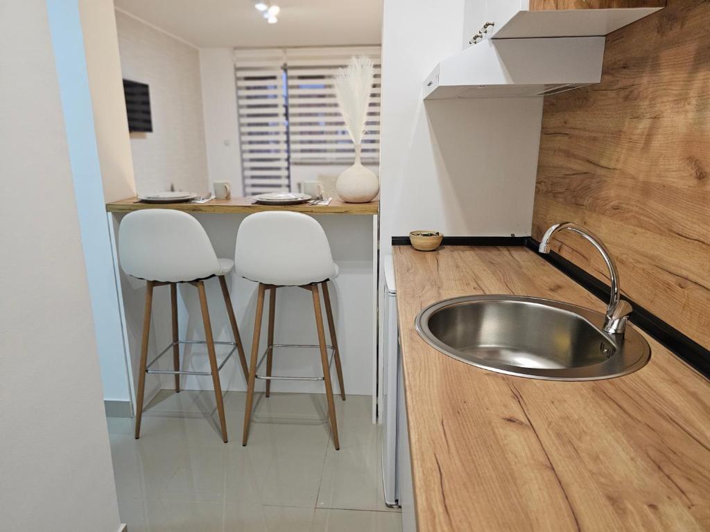 Kuhinja ili čajna kuhinja u objektu Apartman Elle