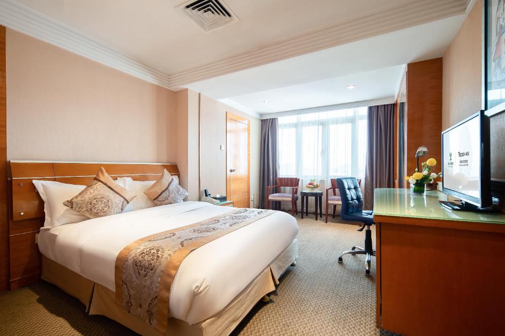 TV a/nebo společenská místnost v ubytování Yihe Hotel Ouzhuang